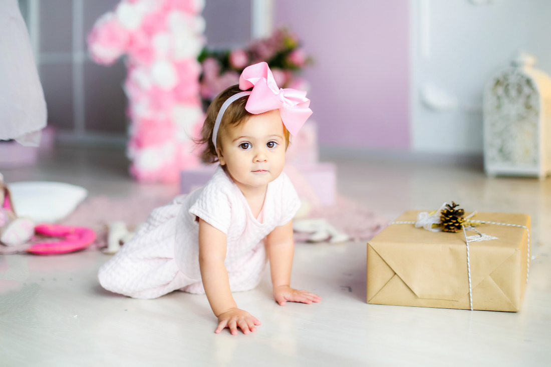 Toddler crawling towards present