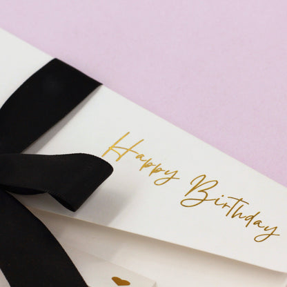 Close up of Happy birthday gold foil