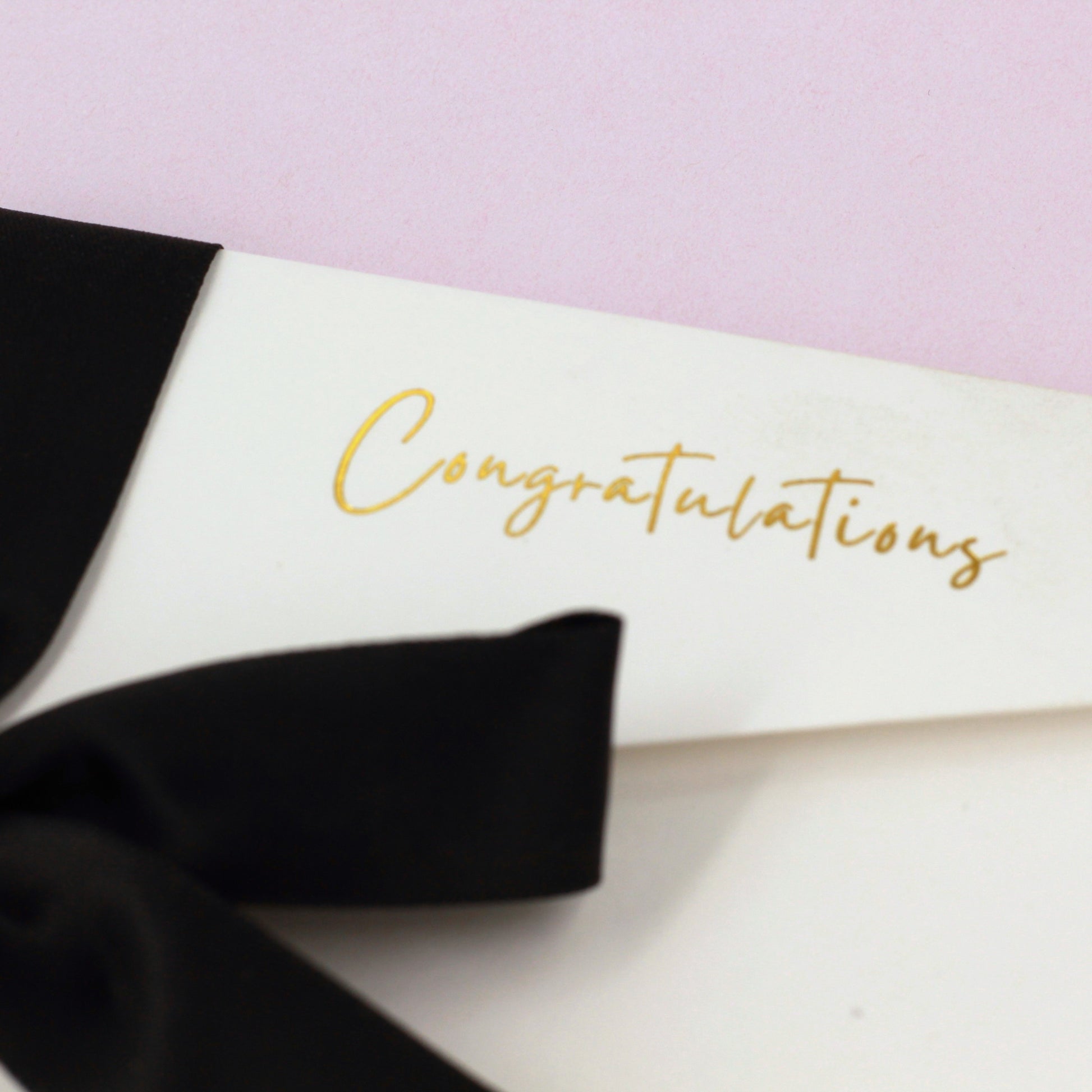 Close up of congratulations gold foil