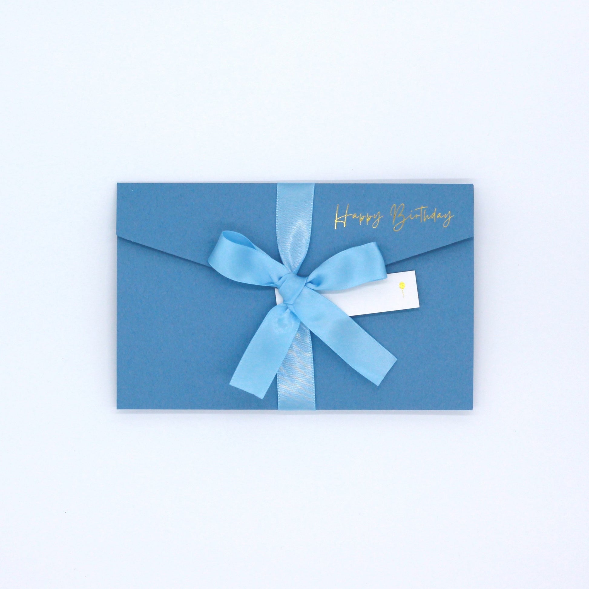 Blue happy birthday pocket greeting card with blue ribbon and white name tag